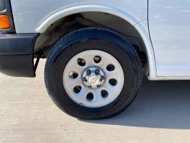 2014 CHEVROLET EXPRESS 1500 PASSENGER PASSENGER V8, FLEX FUEL, 5.3 LITER LS VAN 3D at Motors On Wheels - used car dealership in Houston, Texas.