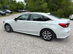 2024 HONDA CIVIC SEDAN 4-CYL, I-VTEC, 2.0 LITER LX SEDAN 4D at T&T Repairables - used car dealership in Spencer, Indiana.