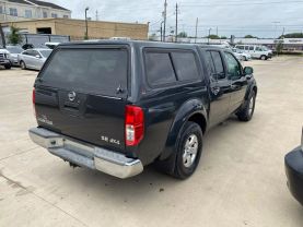 2010 NISSAN FRONTIER PICKUP V6 4.0L GASOLINE CREW CAB LE 4WD 4.0L V6 at Motors On Wheels - used car dealership in Houston, Texas.