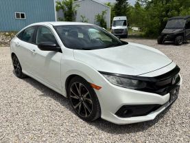 2021 HONDA CIVIC SEDAN 4-CYL, PZEV, I-VTEC, 2.0 LITER SPORT SEDAN 4D at T&T Repairables - used car dealership in Spencer, Indiana.