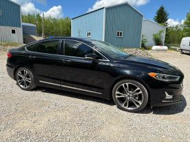 2020 FORD FUSION SEDAN 4-CYL, ECOBOOST, TURBO, 2.0 LITER TITANIUM SEDAN 4D at T&T Repairables - used car dealership in Spencer, Indiana.