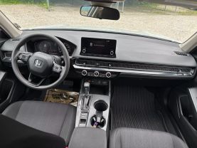 2024 HONDA CIVIC SEDAN 4-CYL, I-VTEC, 2.0 LITER LX SEDAN 4D at T&T Repairables - used car dealership in Spencer, Indiana.