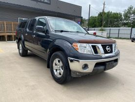2010 NISSAN FRONTIER PICKUP V6 4.0L GASOLINE CREW CAB LE 4WD 4.0L V6 at Motors On Wheels - used car dealership in Houston, Texas.