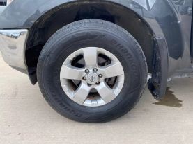 2010 NISSAN FRONTIER PICKUP V6 4.0L GASOLINE CREW CAB LE 4WD 4.0L V6 at Motors On Wheels - used car dealership in Houston, Texas.