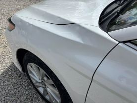 2023 TOYOTA CAMRY SEDAN 4-CYL, 2.5 LITER LE SEDAN 4D at T&T Repairables - used car dealership in Spencer, Indiana.