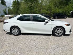 2023 TOYOTA CAMRY SEDAN 4-CYL, 2.5 LITER LE SEDAN 4D at T&T Repairables - used car dealership in Spencer, Indiana.