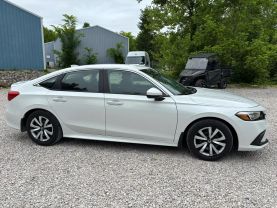 2024 HONDA CIVIC SEDAN 4-CYL, I-VTEC, 2.0 LITER LX SEDAN 4D at T&T Repairables - used car dealership in Spencer, Indiana.