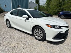 2023 TOYOTA CAMRY SEDAN 4-CYL, 2.5 LITER LE SEDAN 4D at T&T Repairables - used car dealership in Spencer, Indiana.