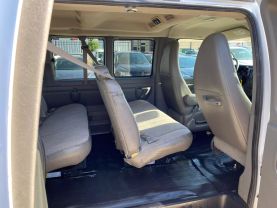 2014 CHEVROLET EXPRESS 1500 PASSENGER PASSENGER V8, FLEX FUEL, 5.3 LITER LS VAN 3D at Motors On Wheels - used car dealership in Houston, Texas.