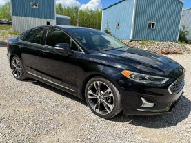 2020 FORD FUSION SEDAN 4-CYL, ECOBOOST, TURBO, 2.0 LITER TITANIUM SEDAN 4D at T&T Repairables - used car dealership in Spencer, Indiana.