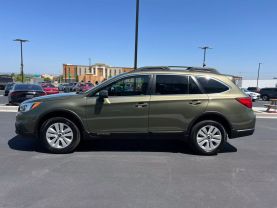 2015 SUBARU OUTBACK WAGON 4-CYL, 2.5 LITER 2.5I PREMIUM WAGON 4D - The Auto Lot