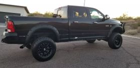 2011 RAM 3500 CREW CAB PICKUP 6-CYL, TURBO DIESEL, 6.7 LITER LARAMIE PICKUP 4D 6 1/3 FT at The One Autosales Inc in Phoenix , AZ 85022  33.60461470880989, -112.03641575767358