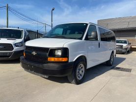 2014 CHEVROLET EXPRESS 1500 PASSENGER PASSENGER V8, FLEX FUEL, 5.3 LITER LS VAN 3D at Motors On Wheels - used car dealership in Houston, Texas.