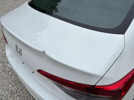 2024 HONDA CIVIC SEDAN 4-CYL, I-VTEC, 2.0 LITER LX SEDAN 4D at T&T Repairables - used car dealership in Spencer, Indiana.