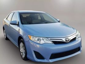 2014 TOYOTA CAMRY SEDAN 4-CYL, 2.5 LITER LE SEDAN 4D at The One Autosales Inc in Phoenix , AZ 85022  33.60461470880989, -112.03641575767358