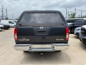 2010 NISSAN FRONTIER PICKUP V6 4.0L GASOLINE CREW CAB LE 4WD 4.0L V6 at Motors On Wheels - used car dealership in Houston, Texas.