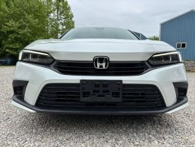 2024 HONDA CIVIC SEDAN 4-CYL, I-VTEC, 2.0 LITER LX SEDAN 4D at T&T Repairables - used car dealership in Spencer, Indiana.