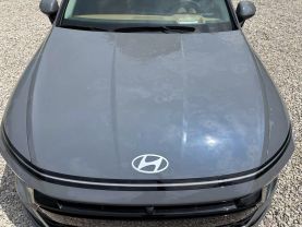2024 HYUNDAI SONATA HYBRID SEDAN 4-CYL, HYBRID, GDI, 2.0 LITER LIMITED SEDAN 4D at T&T Repairables - used car dealership in Spencer, Indiana.