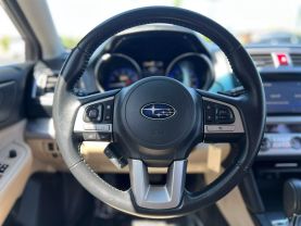 2015 SUBARU OUTBACK WAGON 4-CYL, 2.5 LITER 2.5I PREMIUM WAGON 4D - The Auto Lot