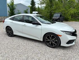 2021 HONDA CIVIC SEDAN 4-CYL, PZEV, I-VTEC, 2.0 LITER SPORT SEDAN 4D at T&T Repairables - used car dealership in Spencer, Indiana.