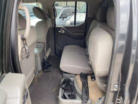 2010 NISSAN FRONTIER PICKUP V6 4.0L GASOLINE CREW CAB LE 4WD 4.0L V6 at Motors On Wheels - used car dealership in Houston, Texas.
