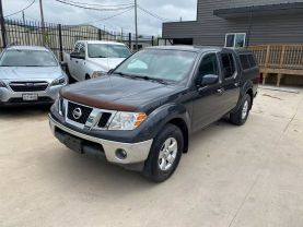 2010 NISSAN FRONTIER PICKUP V6 4.0L GASOLINE CREW CAB LE 4WD 4.0L V6 at Motors On Wheels - used car dealership in Houston, Texas.