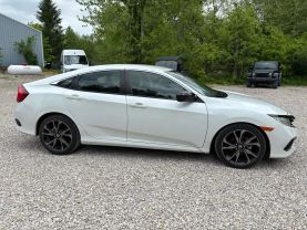 2021 HONDA CIVIC SEDAN 4-CYL, PZEV, I-VTEC, 2.0 LITER SPORT SEDAN 4D at T&T Repairables - used car dealership in Spencer, Indiana.