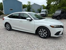 2024 HONDA CIVIC SEDAN 4-CYL, I-VTEC, 2.0 LITER LX SEDAN 4D at T&T Repairables - used car dealership in Spencer, Indiana.