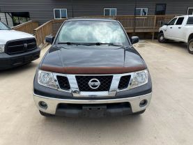 2010 NISSAN FRONTIER PICKUP V6 4.0L GASOLINE CREW CAB LE 4WD 4.0L V6 at Motors On Wheels - used car dealership in Houston, Texas.