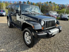 2010 JEEP WRANGLER SUV V6, 3.8 LITER UNLIMITED SAHARA SPORT UTILITY 4D