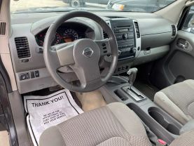 2010 NISSAN FRONTIER PICKUP V6 4.0L GASOLINE CREW CAB LE 4WD 4.0L V6 at Motors On Wheels - used car dealership in Houston, Texas.
