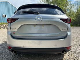 2019 MAZDA CX-5 SUV 4-CYL, SKYACTIV-G, 2.5 LITER TOURING SPORT UTILITY 4D at T&T Repairables - used car dealership in Spencer, Indiana.