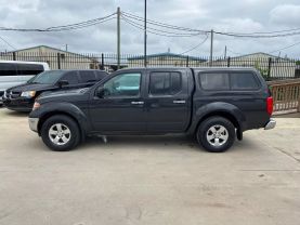 2010 NISSAN FRONTIER PICKUP V6 4.0L GASOLINE CREW CAB LE 4WD 4.0L V6 at Motors On Wheels - used car dealership in Houston, Texas.