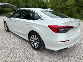 2024 HONDA CIVIC SEDAN 4-CYL, I-VTEC, 2.0 LITER LX SEDAN 4D at T&T Repairables - used car dealership in Spencer, Indiana.