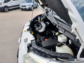 2015 FORD TRANSIT 150 WAGON PASSENGER V6, FLEX FUEL, 3.7 LITER XLT W/LOW ROOF W/60/40 SIDE DOOR VAN 3D at Motors On Wheels - used car dealership in Houston, Texas.