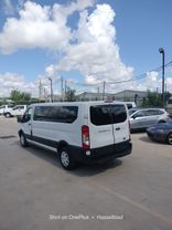 2015 FORD TRANSIT 350 WAGON PASSENGER V6, FLEX FUEL, 3.7 LITER XLT W/LOW ROOF W/60/40 SIDE DOOR VAN 3D at Motors On Wheels - used car dealership in Houston, Texas.