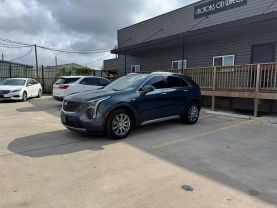 2020 CADILLAC XT4 SUV 4-CYL, TURBO, 2.0 LITER PREMIUM LUXURY SPORT UTILITY 4D at Motors On Wheels - used car dealership in Houston, Texas.