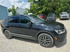 2021 VOLKSWAGEN TIGUAN SUV 4-CYL, TURBO, 2.0 LITER SE 4MOTION SPORT UTILITY 4D at T&T Repairables - used car dealership in Spencer, Indiana.