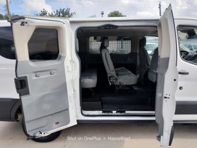 2015 FORD TRANSIT 150 WAGON PASSENGER V6, FLEX FUEL, 3.7 LITER XLT W/LOW ROOF W/60/40 SIDE DOOR VAN 3D at Motors On Wheels - used car dealership in Houston, Texas.