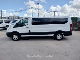 2015 FORD TRANSIT 350 WAGON PASSENGER V6, FLEX FUEL, 3.7 LITER XLT W/LOW ROOF W/60/40 SIDE DOOR VAN 3D at Motors On Wheels - used car dealership in Houston, Texas.
