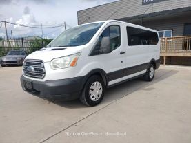 2015 FORD TRANSIT 150 WAGON PASSENGER V6, FLEX FUEL, 3.7 LITER XLT W/LOW ROOF W/60/40 SIDE DOOR VAN 3D at Motors On Wheels - used car dealership in Houston, Texas.