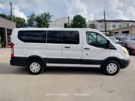 2015 FORD TRANSIT 150 WAGON PASSENGER V6, FLEX FUEL, 3.7 LITER XLT W/LOW ROOF W/60/40 SIDE DOOR VAN 3D at Motors On Wheels - used car dealership in Houston, Texas.
