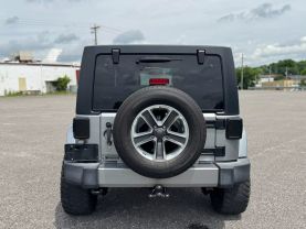 2016 JEEP WRANGLER SUV V6, 3.6 LITER UNLIMITED SAHARA SPORT UTILITY 4D