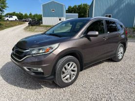 2015 HONDA CR-V SUV 4-CYL, I-VTEC, 2.4 LITER EX-L SPORT UTILITY 4D at T&T Repairables - used car dealership in Spencer, Indiana.