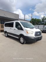 2015 FORD TRANSIT 150 WAGON PASSENGER V6, FLEX FUEL, 3.7 LITER XLT W/LOW ROOF W/60/40 SIDE DOOR VAN 3D at Motors On Wheels - used car dealership in Houston, Texas.