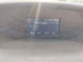 2015 FORD TRANSIT 150 WAGON PASSENGER V6, FLEX FUEL, 3.7 LITER XLT W/LOW ROOF W/60/40 SIDE DOOR VAN 3D at Motors On Wheels - used car dealership in Houston, Texas.