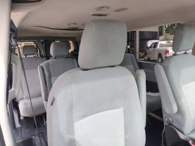 2015 FORD TRANSIT 150 WAGON PASSENGER V6, FLEX FUEL, 3.7 LITER XLT W/LOW ROOF W/60/40 SIDE DOOR VAN 3D at Motors On Wheels - used car dealership in Houston, Texas.
