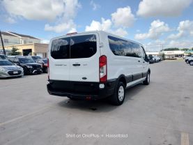 2015 FORD TRANSIT 350 WAGON PASSENGER V6, FLEX FUEL, 3.7 LITER XLT W/LOW ROOF W/60/40 SIDE DOOR VAN 3D at Motors On Wheels - used car dealership in Houston, Texas.