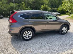 2015 HONDA CR-V SUV 4-CYL, I-VTEC, 2.4 LITER EX-L SPORT UTILITY 4D at T&T Repairables - used car dealership in Spencer, Indiana.