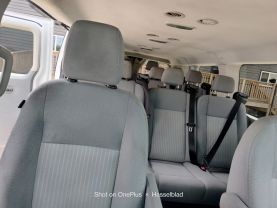 2015 FORD TRANSIT 150 WAGON PASSENGER V6, FLEX FUEL, 3.7 LITER XLT W/LOW ROOF W/60/40 SIDE DOOR VAN 3D at Motors On Wheels - used car dealership in Houston, Texas.